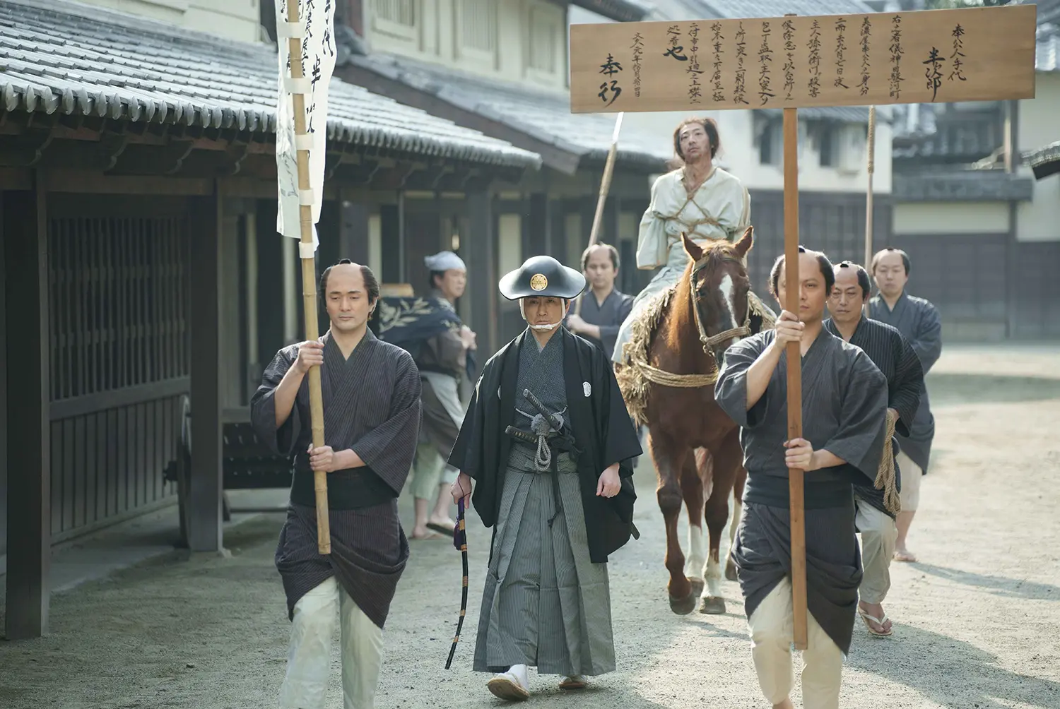 『引かれ者の小唄』